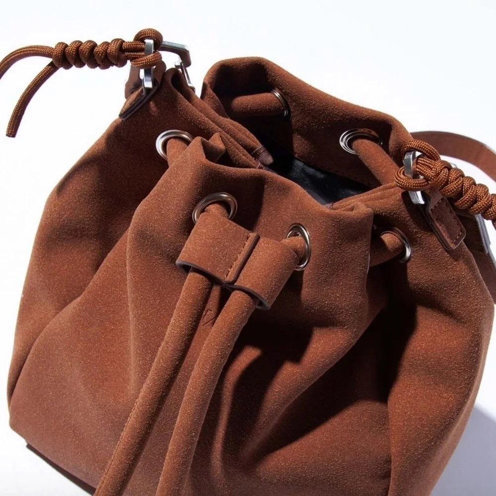 NWOT F/CE. Tech Suede Draw String Bag